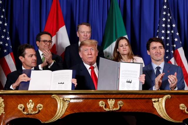 Tariff tensions shadow U..S, Canada, Mexico trade pact signing
