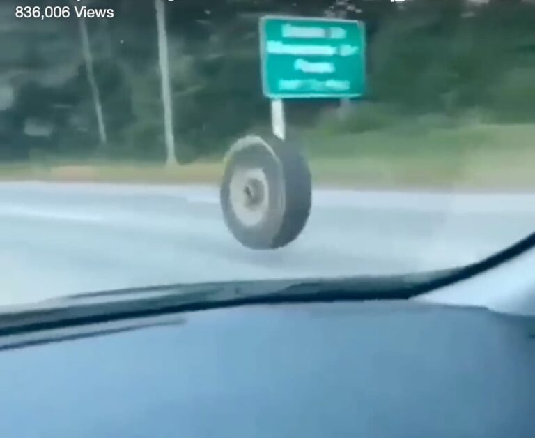 Loose CMV wheel slams Jeep in viral video