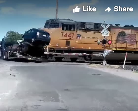 Excuse me, coming through. Train nails car hauler and launches Prius