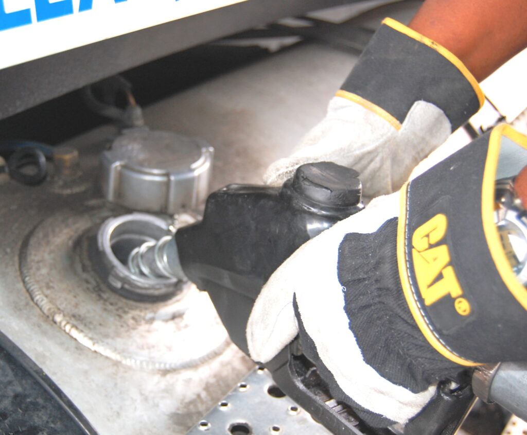 man pumping diesel