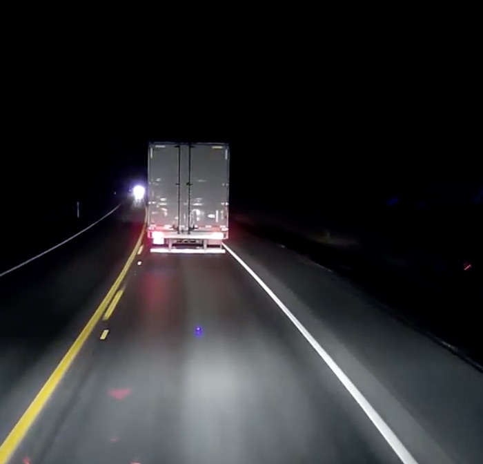 Dash Cam footage of near head on with a semi