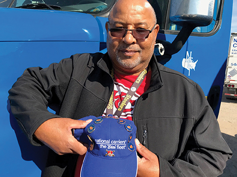 At The Truck Stop: Veteran driver who ‘always gives 110%’ snags National Carriers’ highest driver honor