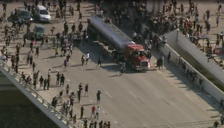 Tanker drives into crowd of protesters in Minneapolis on I-35; driver injured and arrested