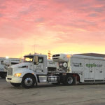 houston Foodbank truck in front of a sunset