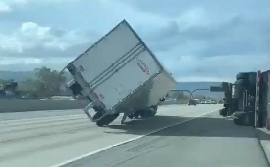 Utah Highway Patrol video shows tractor-trailers blown over by strong winds