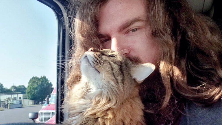 The cat in the cab: Feline friend brings comfort to driver while on the road