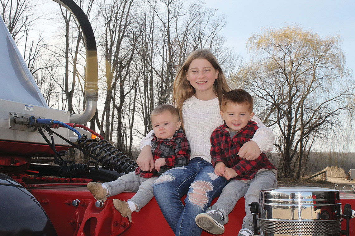 Cute kids on a big truck