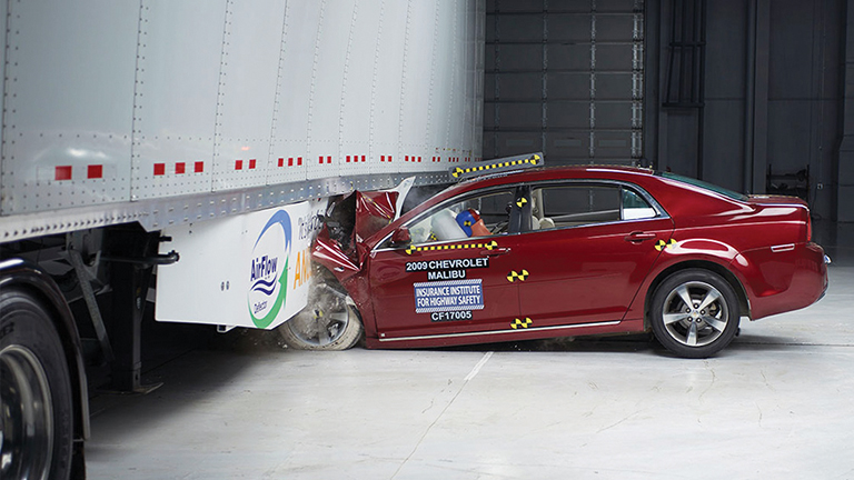 car crashing into trailer test