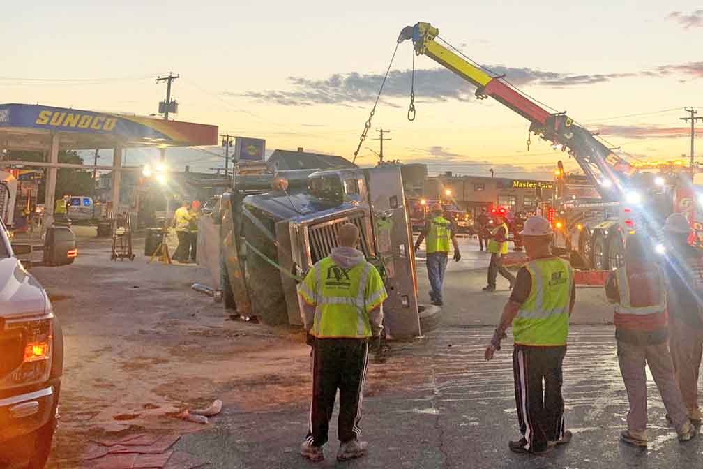 Tanker truck rolls over near Boston, spilling diesel fuel - TheTrucker.com