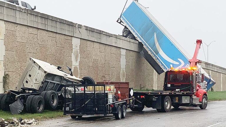 Amazon truck leaps over bridge