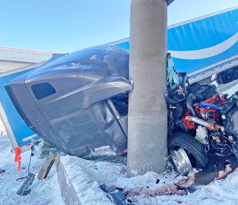 Driver OK after icy big rig crash