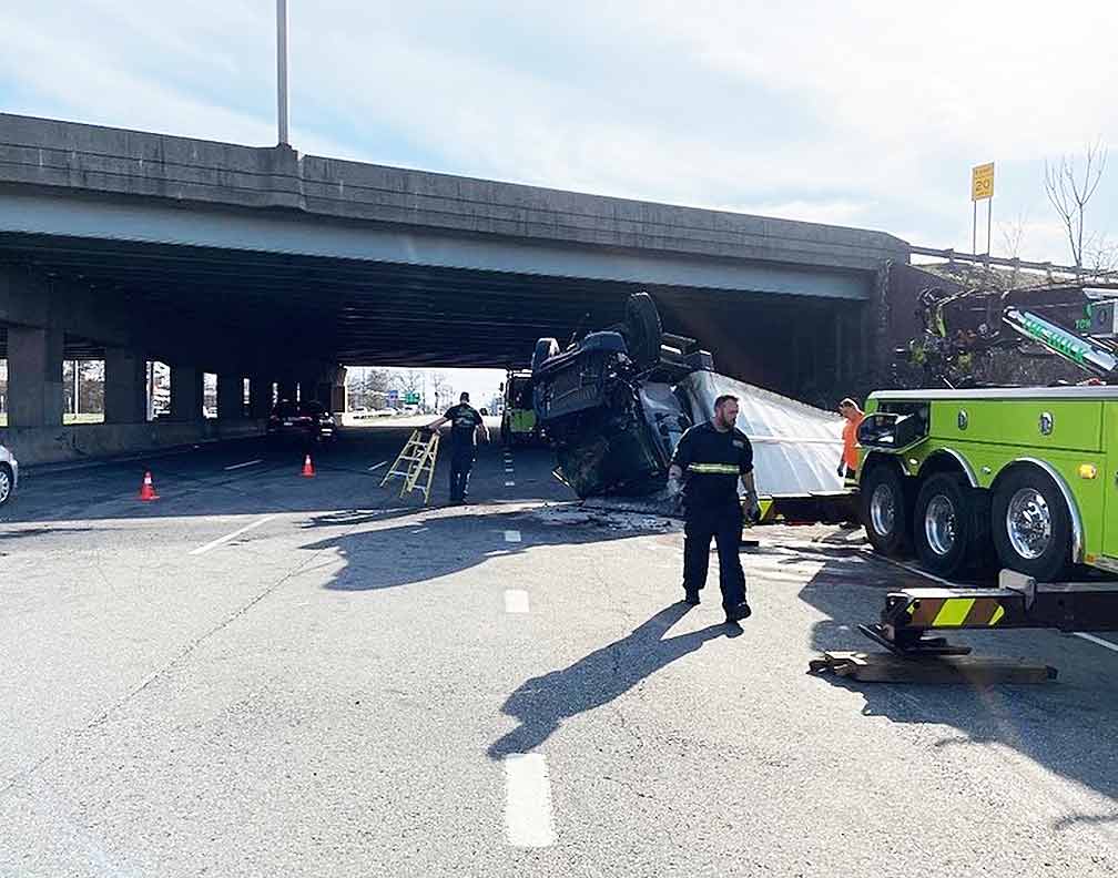 Tractortrailer falls off I95 after being struck by car