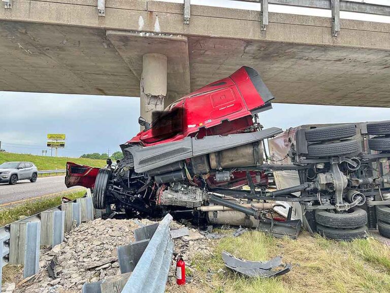 Truck driver injured after big rig slams into bridge support beam