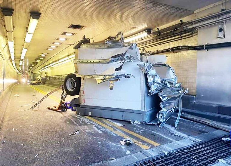 Tractor-trailer splits in 2, shuts down Alabama tunnel