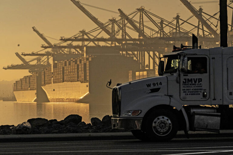 West Coast dockworkers, including truck drivers, still talking after contract expires