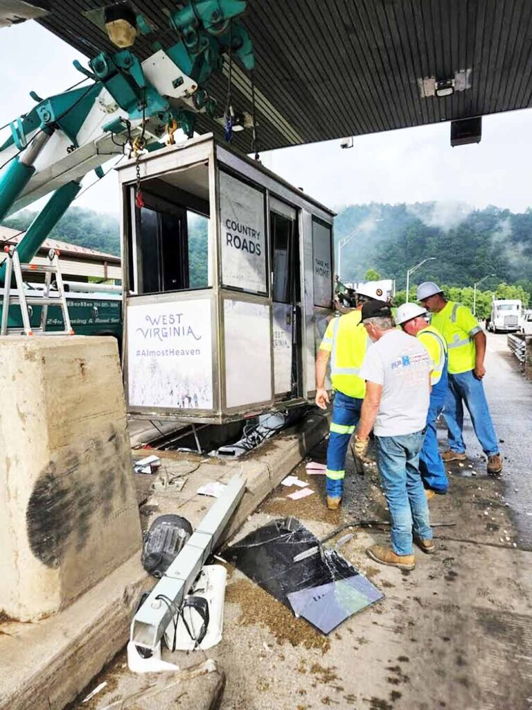 Tractor-trailer hits toll booth, injures toll collector