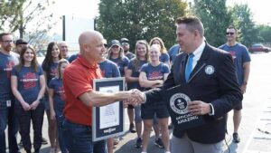 22 09 12 Truckstop GUINNESS WORLD RECORDS Title Presentation Brent Hutto Chief Relationship Officer Truckstop and Michael Empric Guinness World Record Adjudicator Web