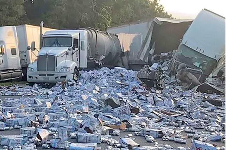 A truck collision turns a Florida highway into a silver sea of beer cans
