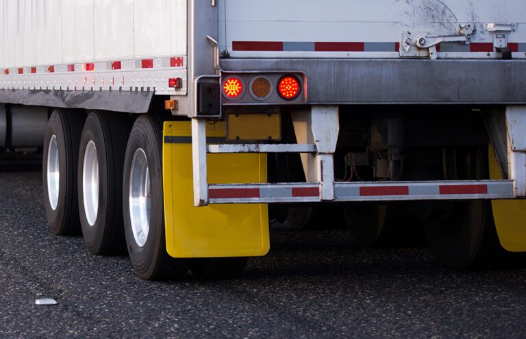 Simple but ingenious: There’s a history behind those mud flaps on your rig
