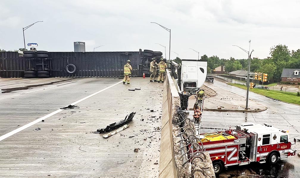 Oklahoma City firefighters rescue truck driver whose rig ran off I-44 ...