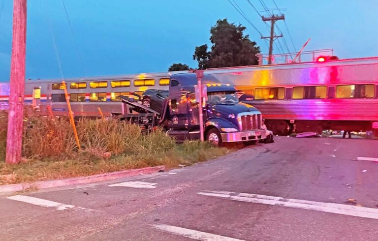 Big rig hauling cars collides with Amtrak train in Lakeland, Florida