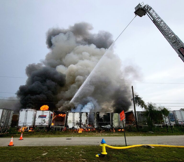 Live wire sparks fire, destroying 11 semi-trailers in Tampa, Florida