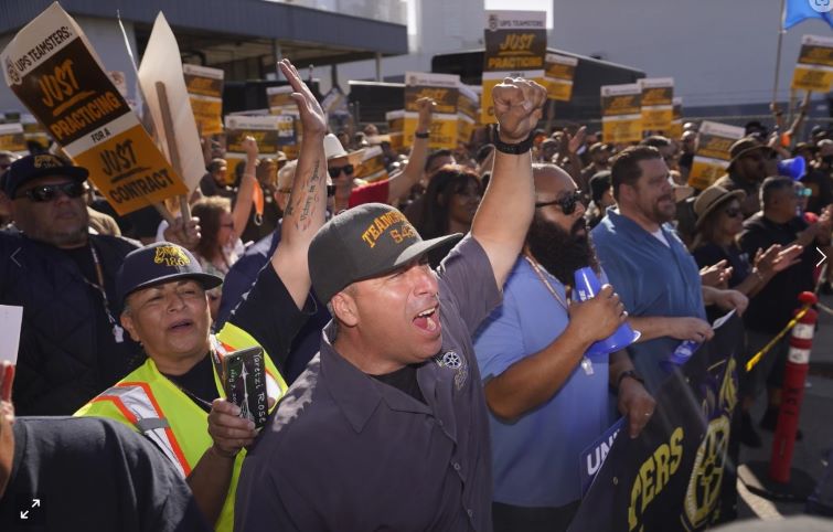 UPS workers approve 5-year contract, capping contentious negotiations that threatened deliveries