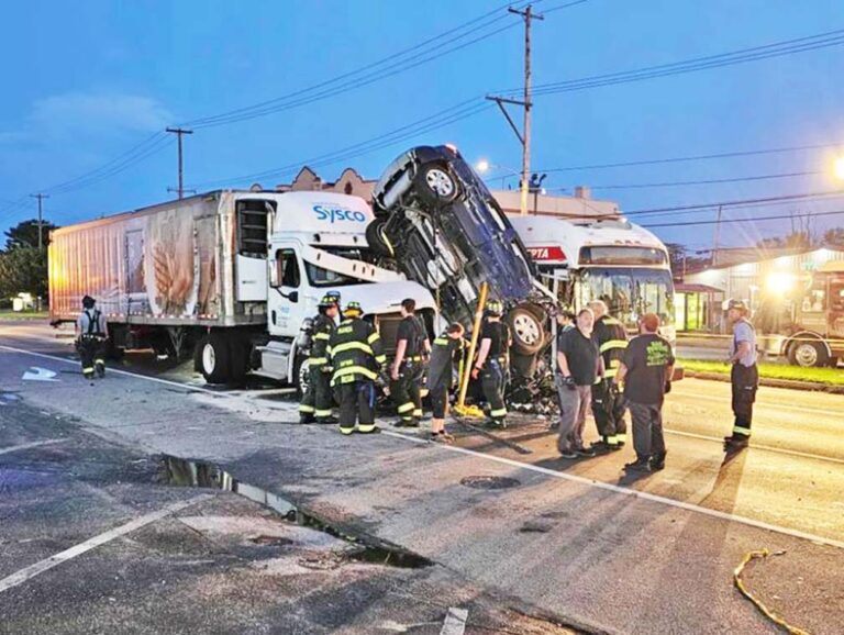 Wreck leaves SUV wedged between big rig, Philadelphia city bus