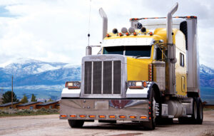 American icon of style customized yellow semi truck rig