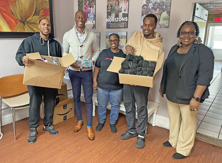 XPO workers donate thousands of socks to homeless shelters