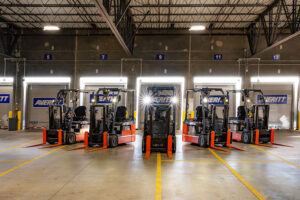 The new electric-powered forklifts in the new, environmentally friendly Mobile Averitt facility. Another environmental feature is a solar panel that provides electricity to the security fence. (Courtesy: Averitt)