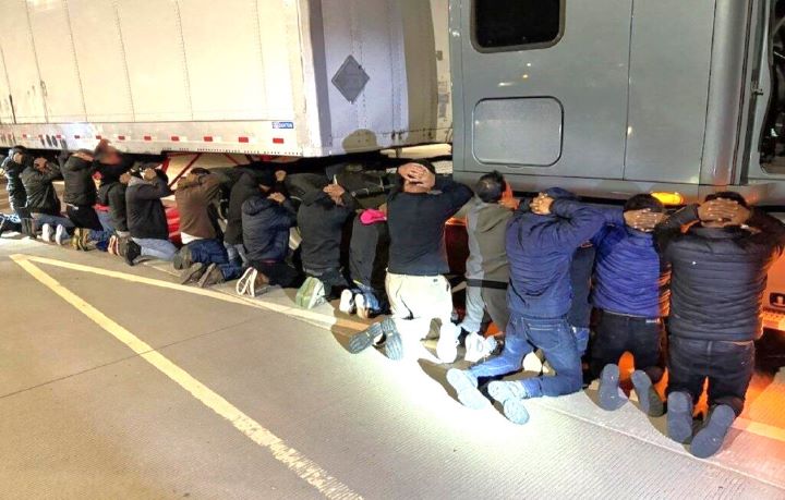 Border agents arrest 18 migrants hiding in 18-wheeler
