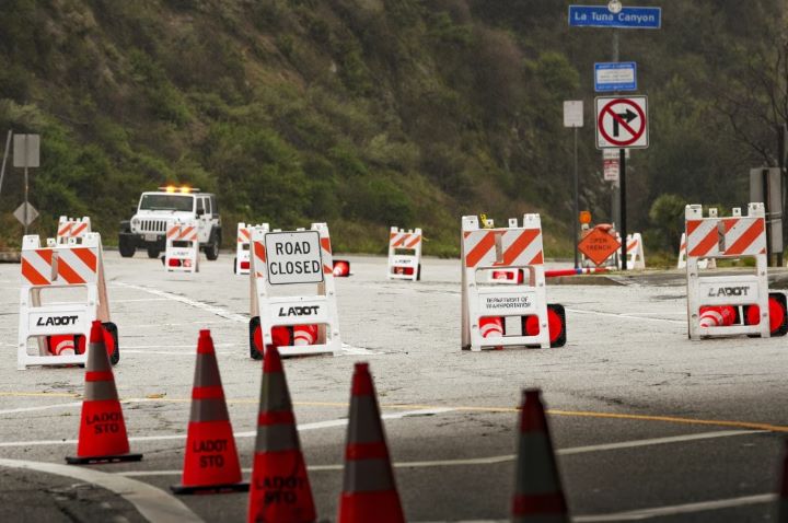 Second atmospheric river churns through California, flooding roads