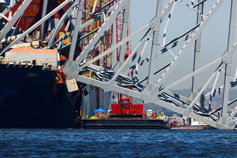Ship that caused bridge collapse had apparent electrical issues while still docked, AP source says