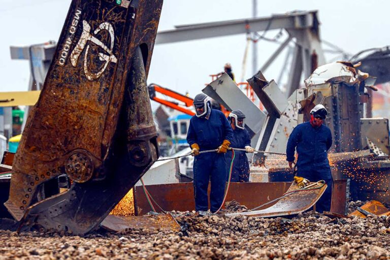 Salvage crews race against clock to remove massive chunks of fallen Baltimore bridge