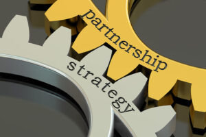 Strategy Partnership concept on the gearwheels, 3D rendering
