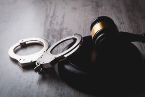 Legal law concept image gavel and handcuffs