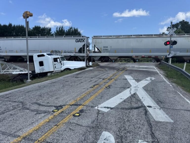 Train hits trailer stuck on Texas tracks