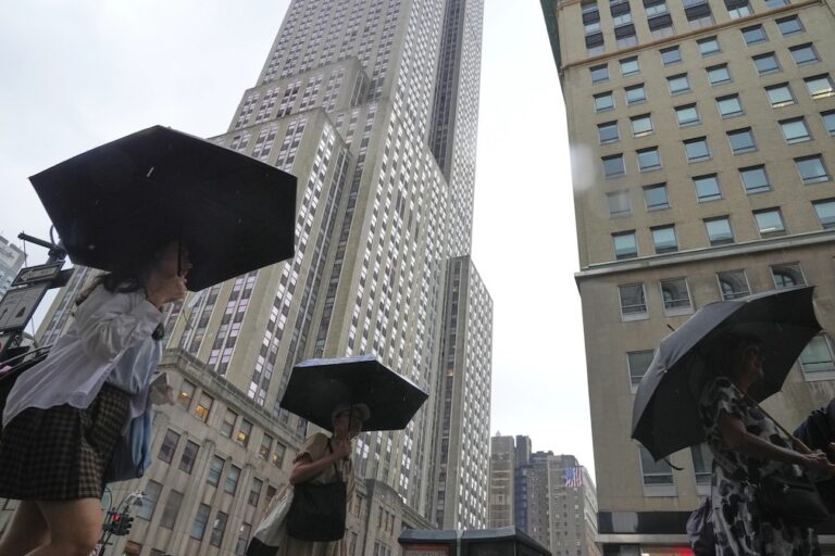 Heavy rain pummels the East Coast and sparks isolated flash flooding