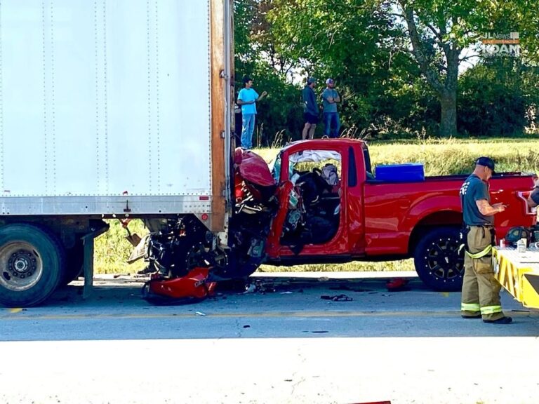One injured when pickup truck rear-ends semi truck