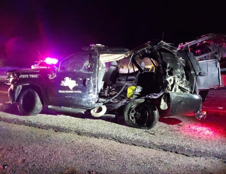 Semi crashes into police unit in Texas