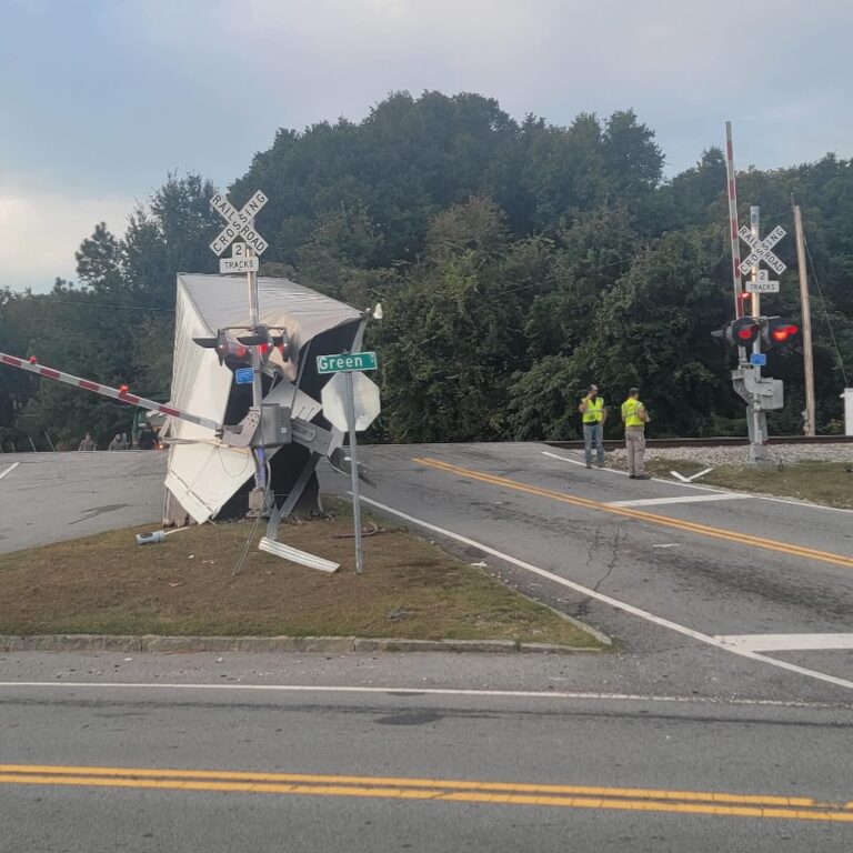 Train crashes with semi stuck on tracks in Georgia
