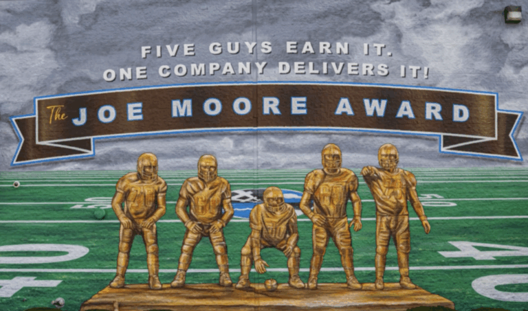Painting a legacy: Logistics Plus unveils Joe Moore mural