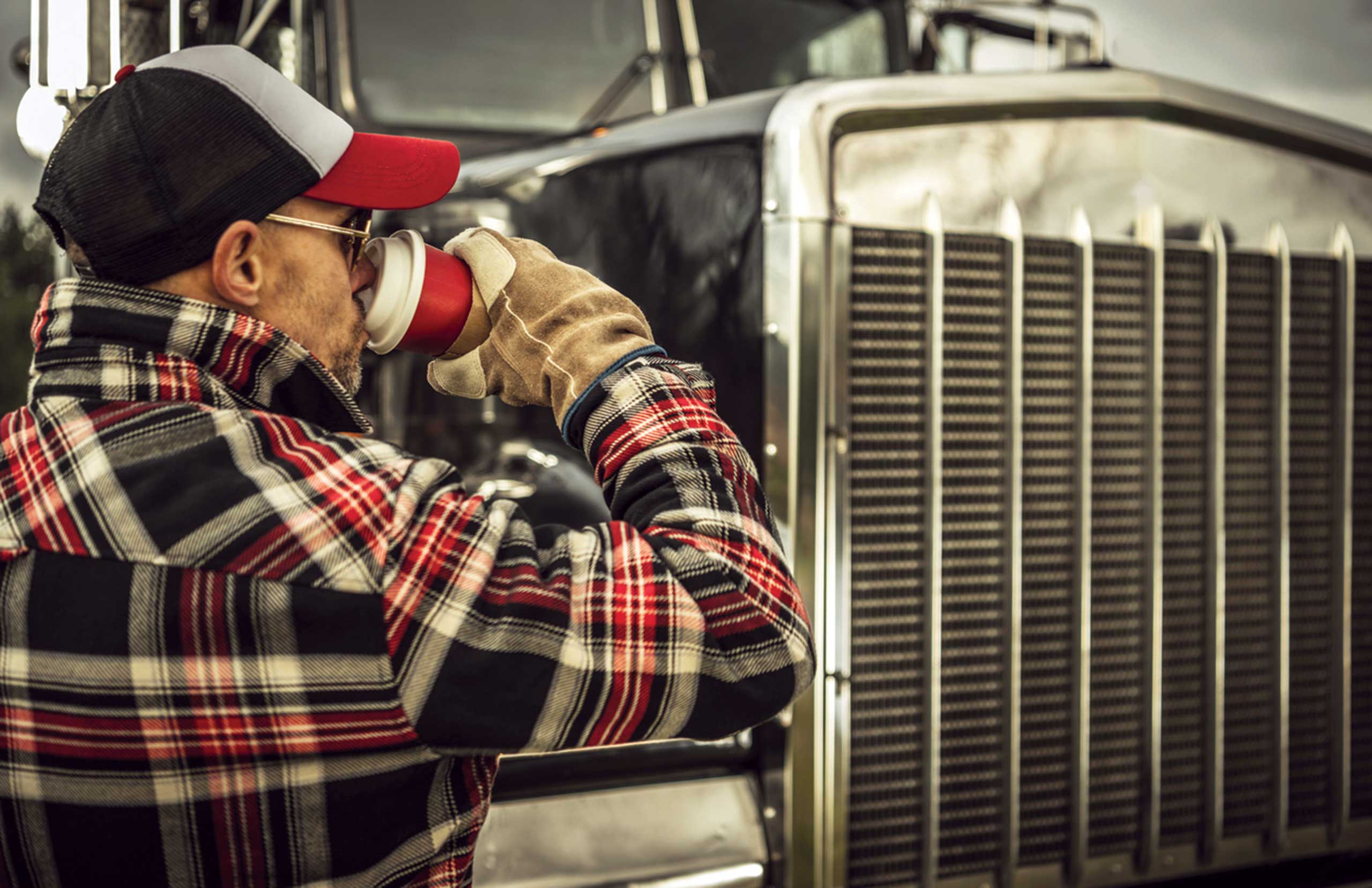 Trucker with Coffee iStock 1945571145 web