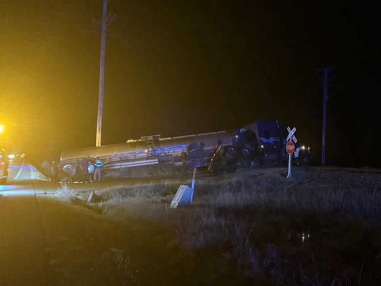 Big rig nearly overturns on train track in rural Arkansas