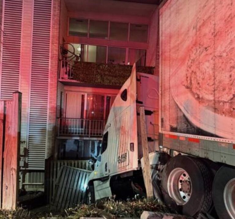 Close call: Big rig nearly hits Maryland apartment complex