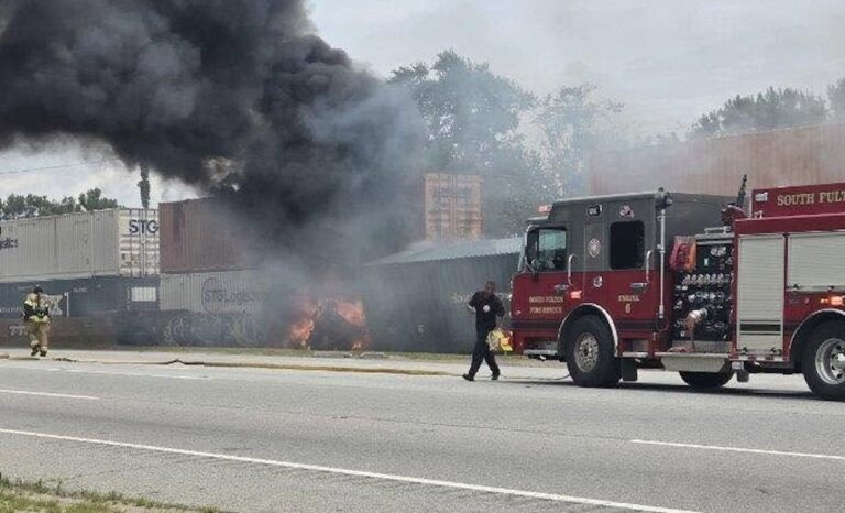 Semi stuck on railroad tracks gets hit by train in Georgia