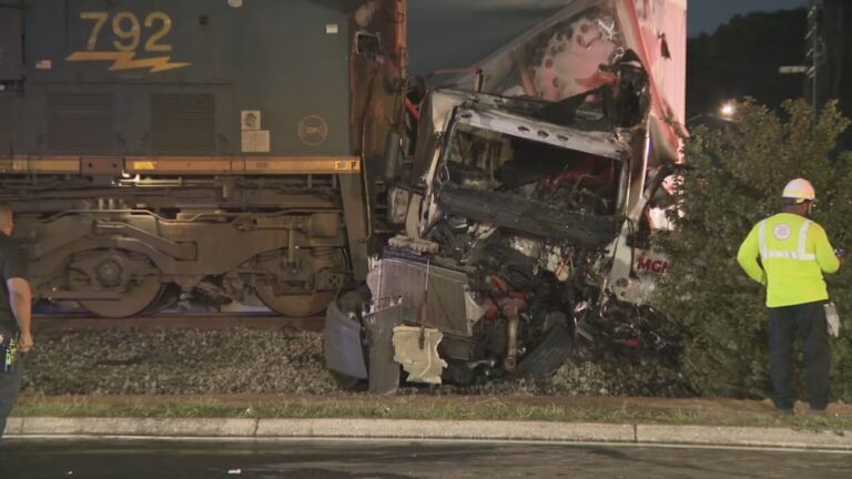 Trucker unaccounted for in fiery crash with train in Atlanta