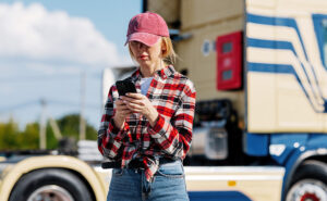 Trucker with Phone iStock 2292883261 web
