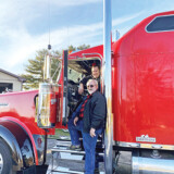 Lamar Buckwalter (in the cab) operates a trucking business with his father, Mark Buckwalter. (Photo by Lane Buckwalter)